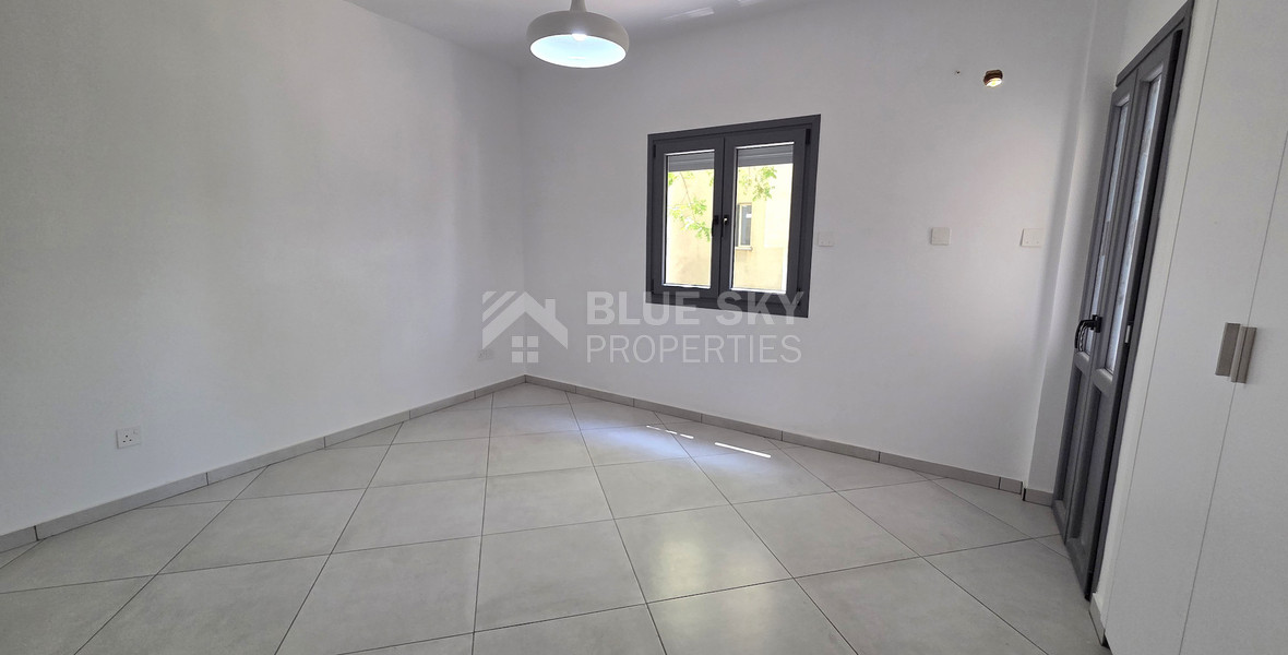 Just 300 meters from the sea, Newly renovated, spacious Two-bedroom apartment with a private garden, Neapoli, Limassol – the perfect home in a prestigious location.