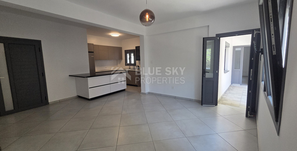 Just 300 meters from the sea, Newly renovated, spacious Two-bedroom apartment with a private garden, Neapoli, Limassol – the perfect home in a prestigious location.