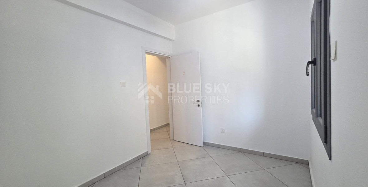 Just 300 meters from the sea, Newly renovated, spacious Two-bedroom apartment with a private garden, Neapoli, Limassol – the perfect home in a prestigious location.