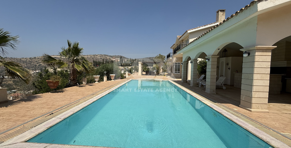 SALE  EXCLUSIVE LISTING large villa on 4,929 sqm of land in Agios Tychonas with panoramic unobstructed sea views- private road and drive in.