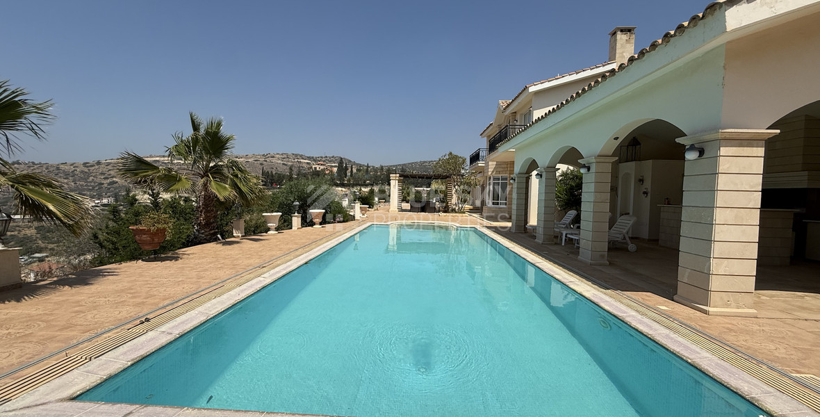 sale: large villa on 4,929 sqm of land in Agios Tychonas with panoramic unobstructed sea views- private road and drive in.