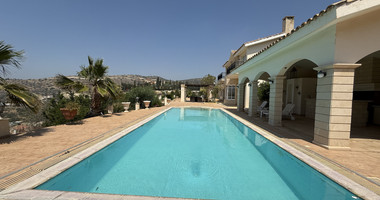 sale: large villa on 4,929 sqm of land in Agios Tychonas with panoramic unobstructed sea views- private road and drive in.