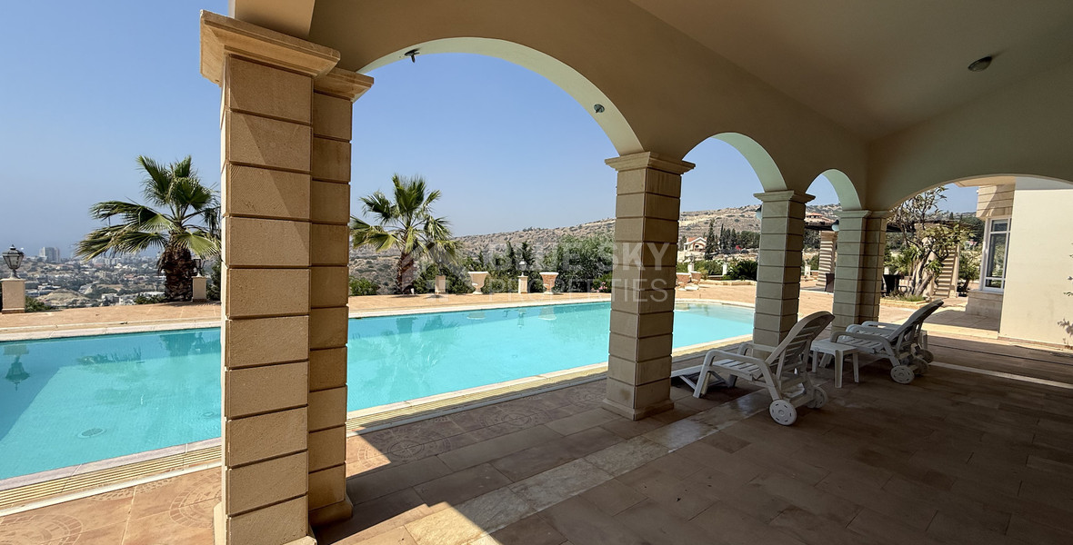sale: large villa on 4,929 sqm of land in Agios Tychonas with panoramic unobstructed sea views- private road and drive in.