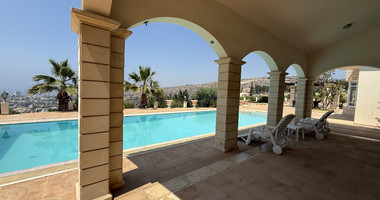 SALE  EXCLUSIVE LISTING large villa on 4,929 sqm of land in Agios Tychonas with panoramic unobstructed sea views- private road and drive in.