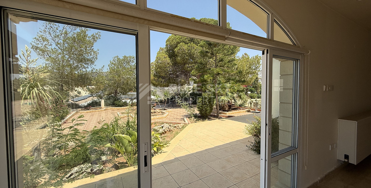 sale: large villa on 4,929 sqm of land in Agios Tychonas with panoramic unobstructed sea views- private road and drive in.