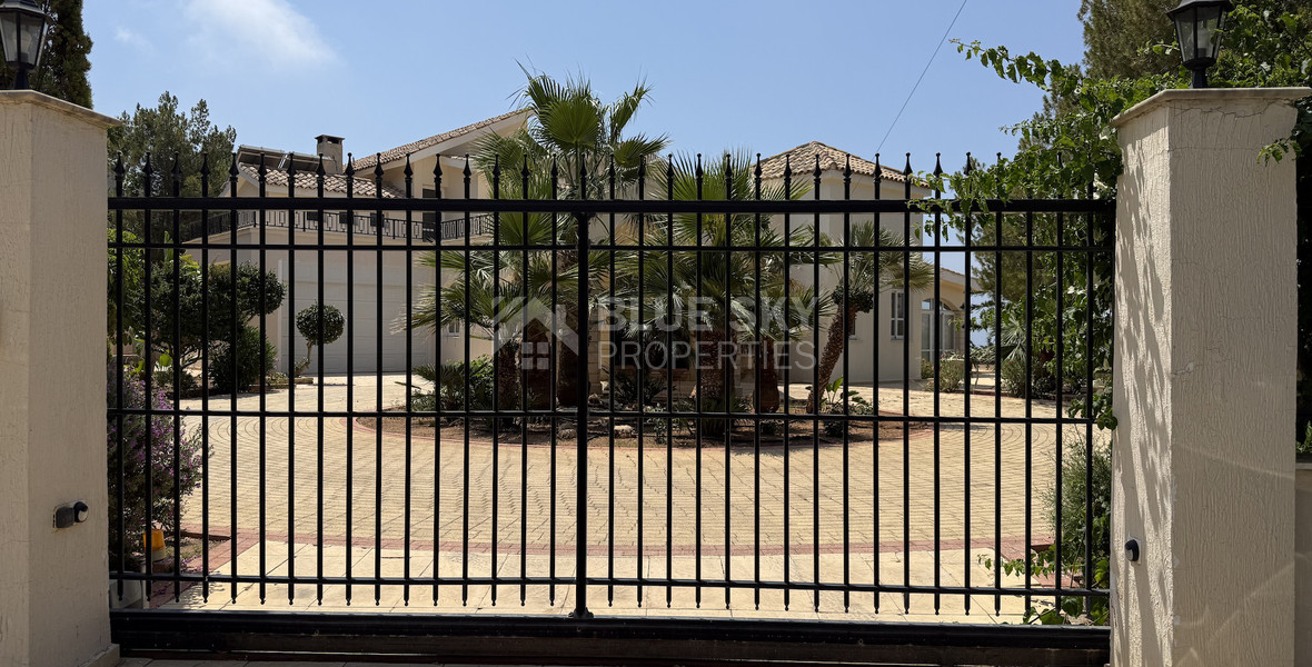 sale: large villa on 4,929 sqm of land in Agios Tychonas with panoramic unobstructed sea views- private road and drive in.