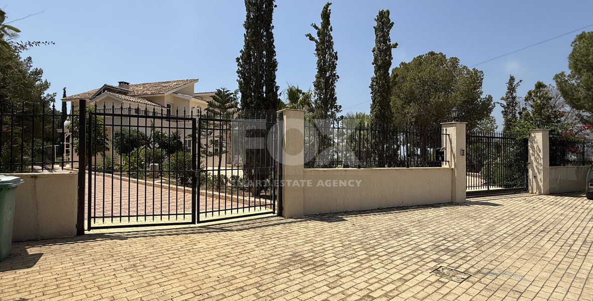 SALE  EXCLUSIVE LISTING large villa on 4,929 sqm of land in Agios Tychonas with panoramic unobstructed sea views- private road and drive in.