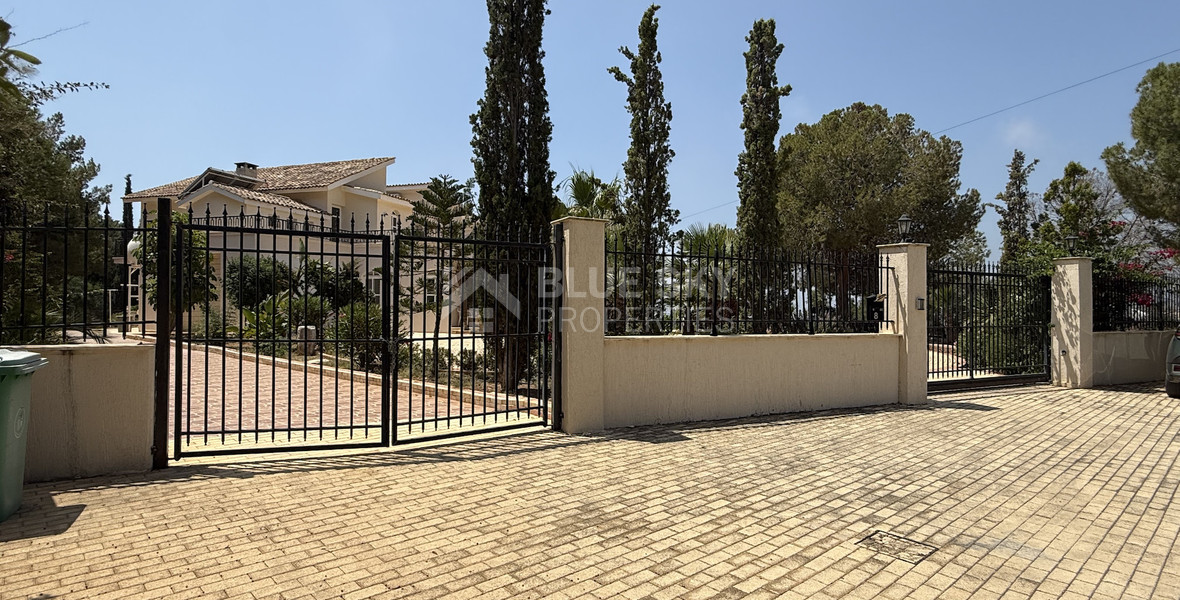 sale: large villa on 4,929 sqm of land in Agios Tychonas with panoramic unobstructed sea views- private road and drive in.