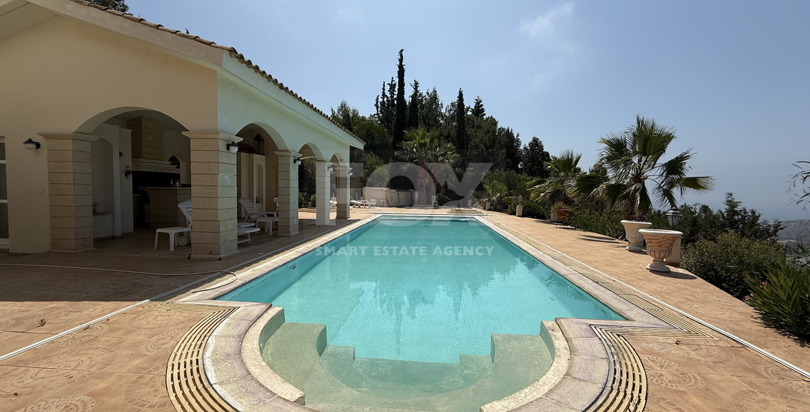 SALE  EXCLUSIVE LISTING large villa on 4,929 sqm of land in Agios Tychonas with panoramic unobstructed sea views- private road and drive in.