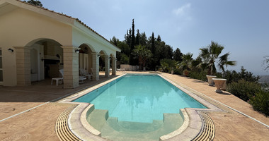 sale: large villa on 4,929 sqm of land in Agios Tychonas with panoramic unobstructed sea views- private road and drive in.