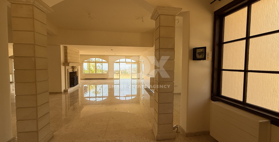 SALE  EXCLUSIVE LISTING large villa on 4,929 sqm of land in Agios Tychonas with panoramic unobstructed sea views- private road and drive in.