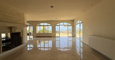 sale: large villa on 4,929 sqm of land in Agios Tychonas with panoramic unobstructed sea views- private road and drive in.