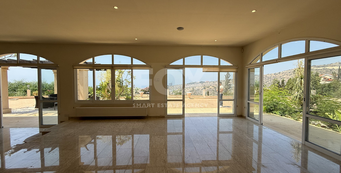 SALE  EXCLUSIVE LISTING large villa on 4,929 sqm of land in Agios Tychonas with panoramic unobstructed sea views- private road and drive in.