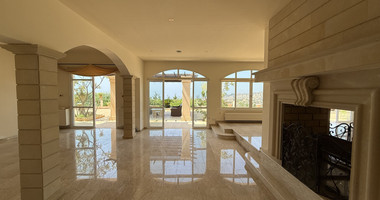 sale: large villa on 4,929 sqm of land in Agios Tychonas with panoramic unobstructed sea views- private road and drive in.