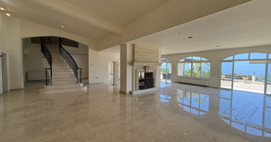 sale: large villa on 4,929 sqm of land in Agios Tychonas with panoramic unobstructed sea views- private road and drive in.