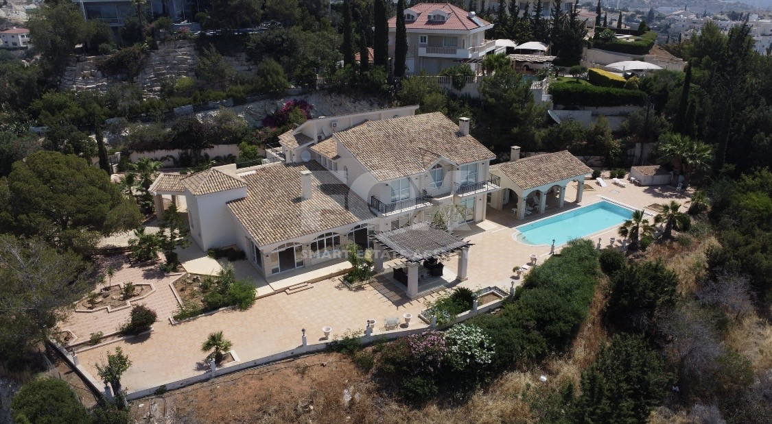 SALE  EXCLUSIVE LISTING large villa on 4,929 sqm of land in Agios Tychonas with panoramic unobstructed sea views- private road and drive in.