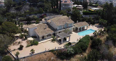 SALE  EXCLUSIVE LISTING large villa on 4,929 sqm of land in Agios Tychonas with panoramic unobstructed sea views- private road and drive in.