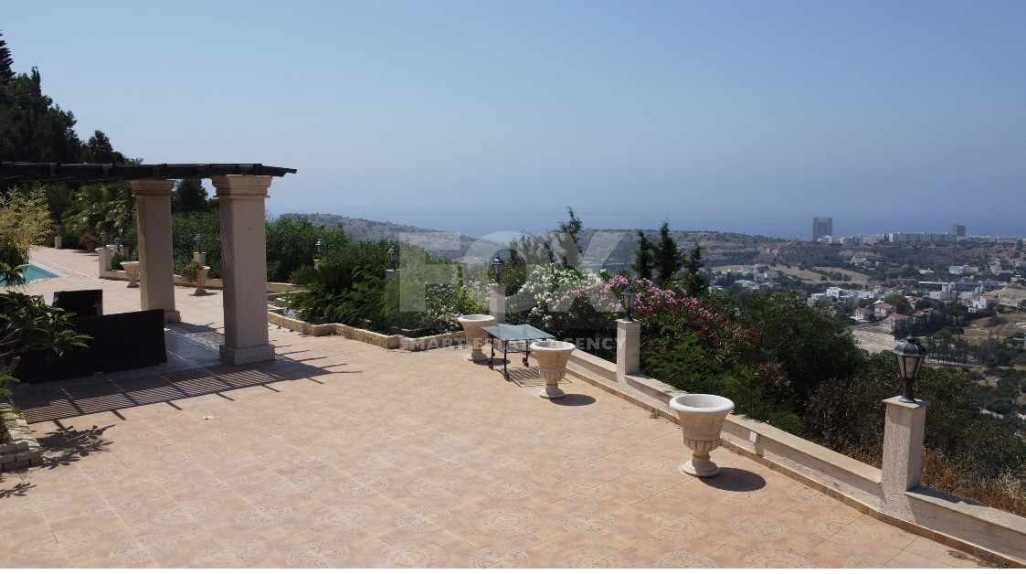 SALE  EXCLUSIVE LISTING large villa on 4,929 sqm of land in Agios Tychonas with panoramic unobstructed sea views- private road and drive in.