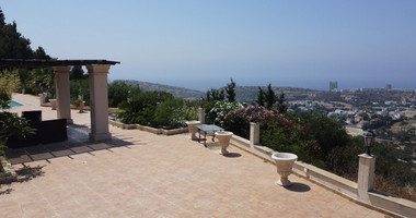 SALE  EXCLUSIVE LISTING large villa on 4,929 sqm of land in Agios Tychonas with panoramic unobstructed sea views- private road and drive in.