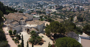 SALE  EXCLUSIVE LISTING large villa on 4,929 sqm of land in Agios Tychonas with panoramic unobstructed sea views- private road and drive in.