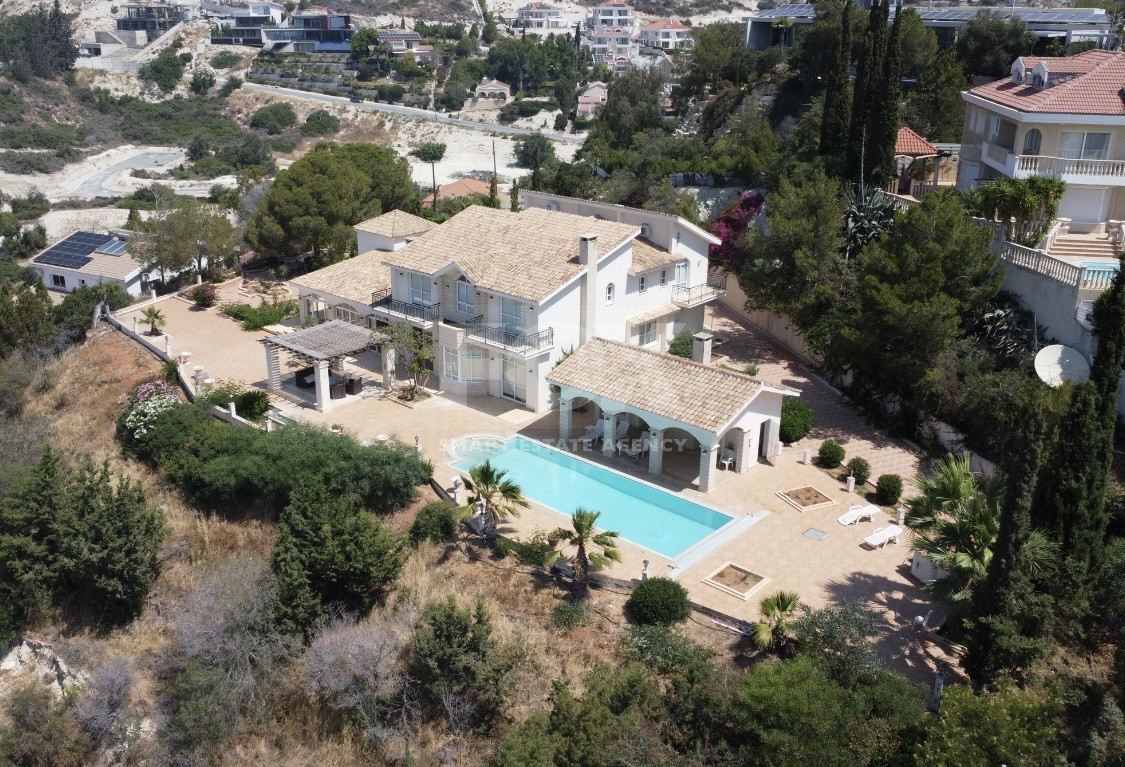 SALE  EXCLUSIVE LISTING large villa on 4,929 sqm of land in Agios Tychonas with panoramic unobstructed sea views- private road and drive in.