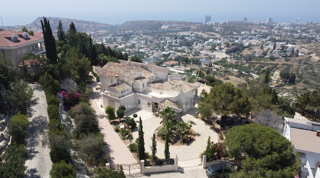 SALE  EXCLUSIVE LISTING large villa on 4,929 sqm of land in Agios Tychonas with panoramic unobstructed sea views- private road and drive in.