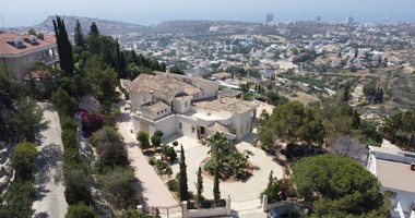 SALE  EXCLUSIVE LISTING large villa on 4,929 sqm of land in Agios Tychonas with panoramic unobstructed sea views- private road and drive in.
