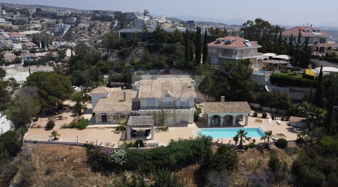 SALE  EXCLUSIVE LISTING large villa on 4,929 sqm of land in Agios Tychonas with panoramic unobstructed sea views- private road and drive in.