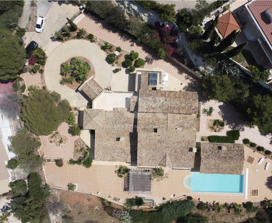 SALE  EXCLUSIVE LISTING large villa on 4,929 sqm of land in Agios Tychonas with panoramic unobstructed sea views- private road and drive in.