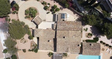 SALE  EXCLUSIVE LISTING large villa on 4,929 sqm of land in Agios Tychonas with panoramic unobstructed sea views- private road and drive in.