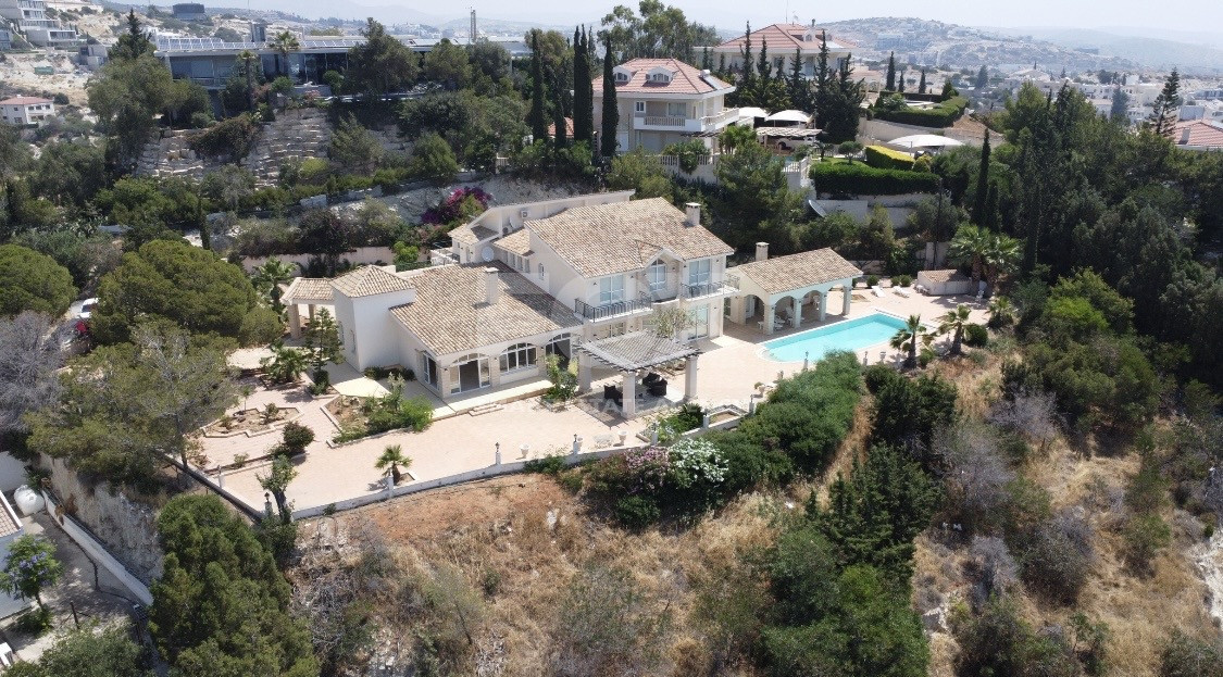 SALE  EXCLUSIVE LISTING large villa on 4,929 sqm of land in Agios Tychonas with panoramic unobstructed sea views- private road and drive in.