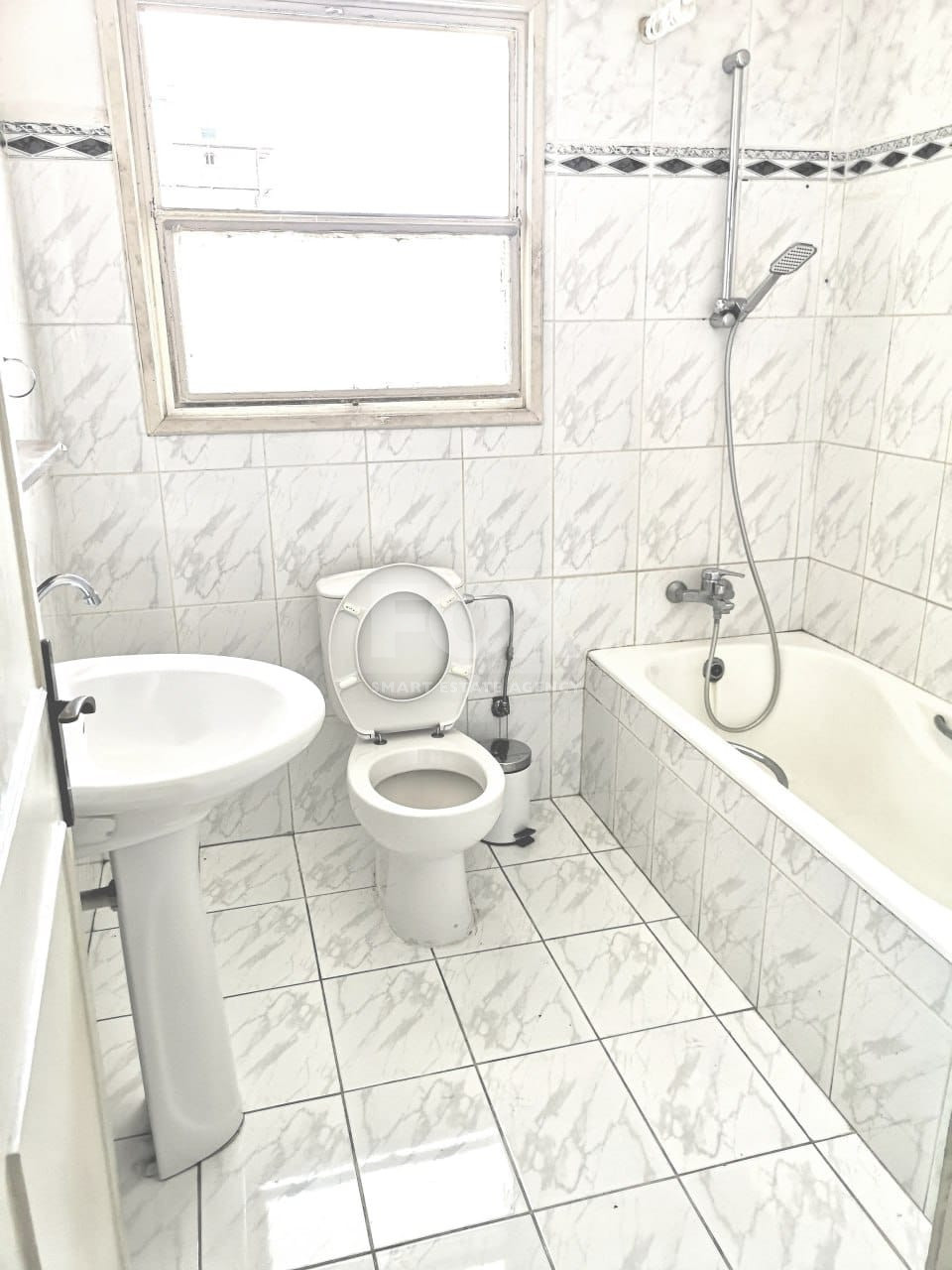 Spacious Renovated Two-Bedroom Apartment for Rent in Agia Zoni