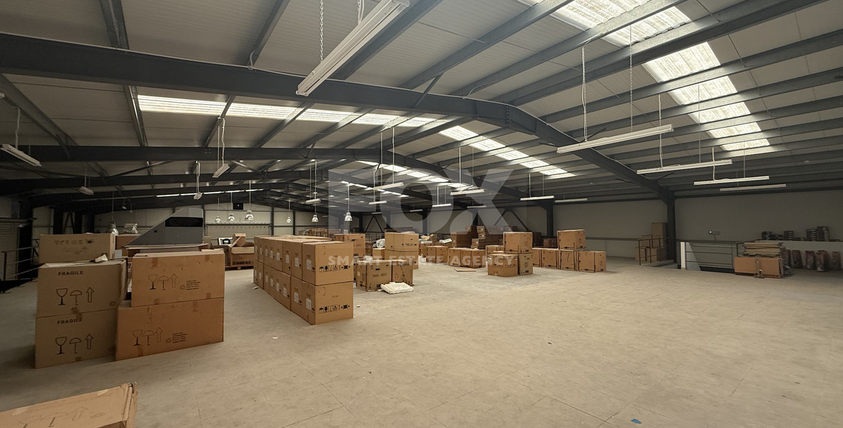 SALE: WAREHOUSE IN PRIME LOCATION INDUSTRIAL AREA OFFERING COVERED AREA OF 2,100 SQM ON A PLOT OF 4467
