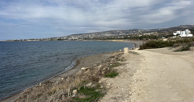 Rare Beachfront Opportunity : Prime Plot with Plans for two Luxury Villas in Kissonerga