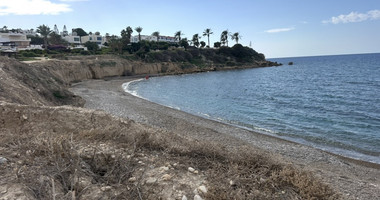 Rare Beachfront Opportunity : Prime Plot with Plans for two Luxury Villas in Kissonerga