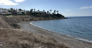 Rare Beachfront Opportunity : Prime Plot with Plans for two Luxury Villas in Kissonerga