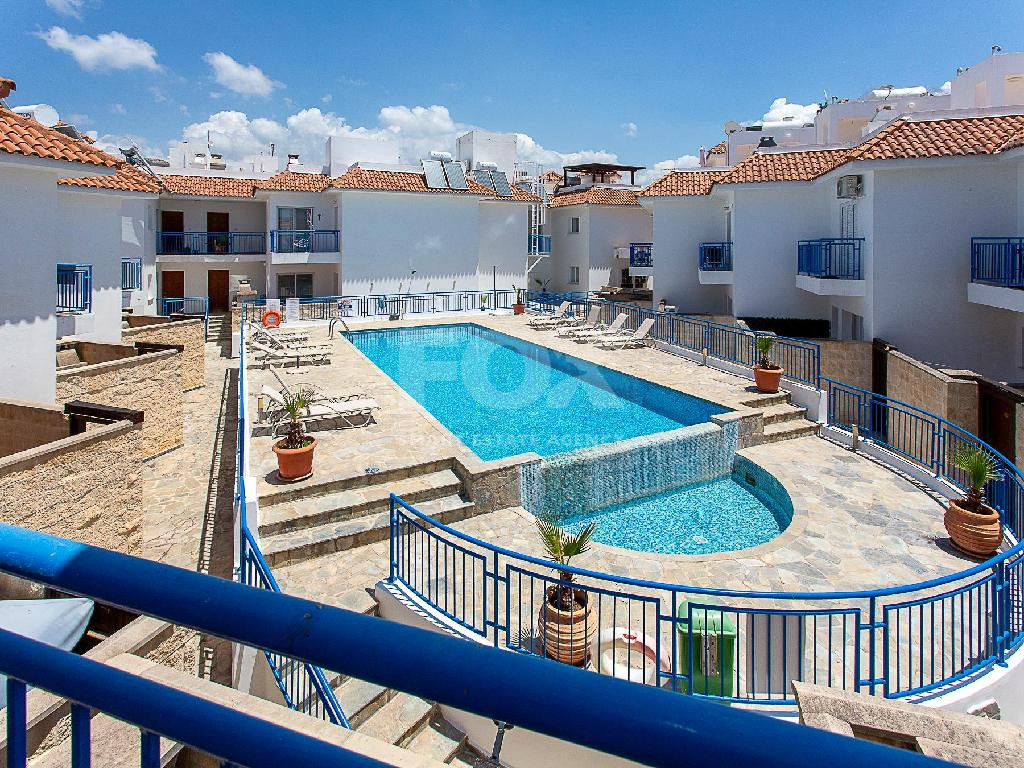 A two-bedroom house for sale in Argaka, Paphos, offering verandas, rooftop terrace, and excellent potential for permanent living, holidays, or rental investment.