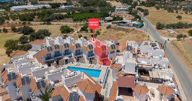 A two-bedroom house for sale in Argaka, Paphos, offering verandas, rooftop terrace, and excellent potential for permanent living, holidays, or rental investment.