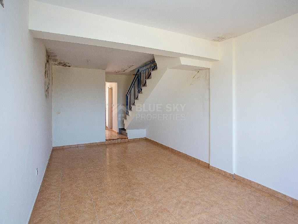 A two-bedroom house for sale in Argaka, Paphos, offering verandas, rooftop terrace, and excellent potential for permanent living, holidays, or rental investment.