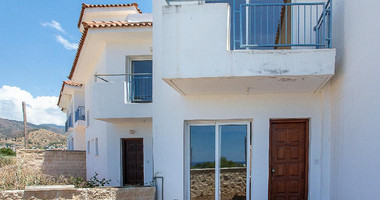 A two-bedroom house for sale in Argaka, Paphos, offering verandas, rooftop terrace, and excellent potential for permanent living, holidays, or rental investment.