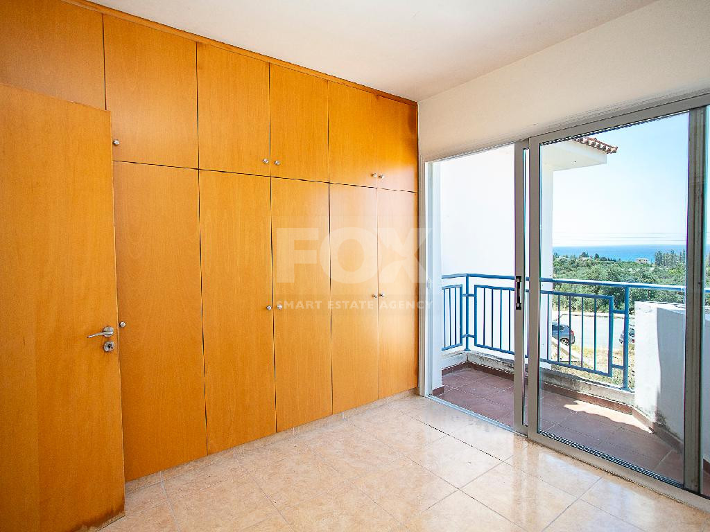 A two-bedroom house for sale in Argaka, Paphos, offering verandas, rooftop terrace, and excellent potential for permanent living, holidays, or rental investment.