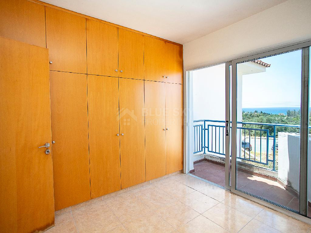 A two-bedroom house for sale in Argaka, Paphos, offering verandas, rooftop terrace, and excellent potential for permanent living, holidays, or rental investment.