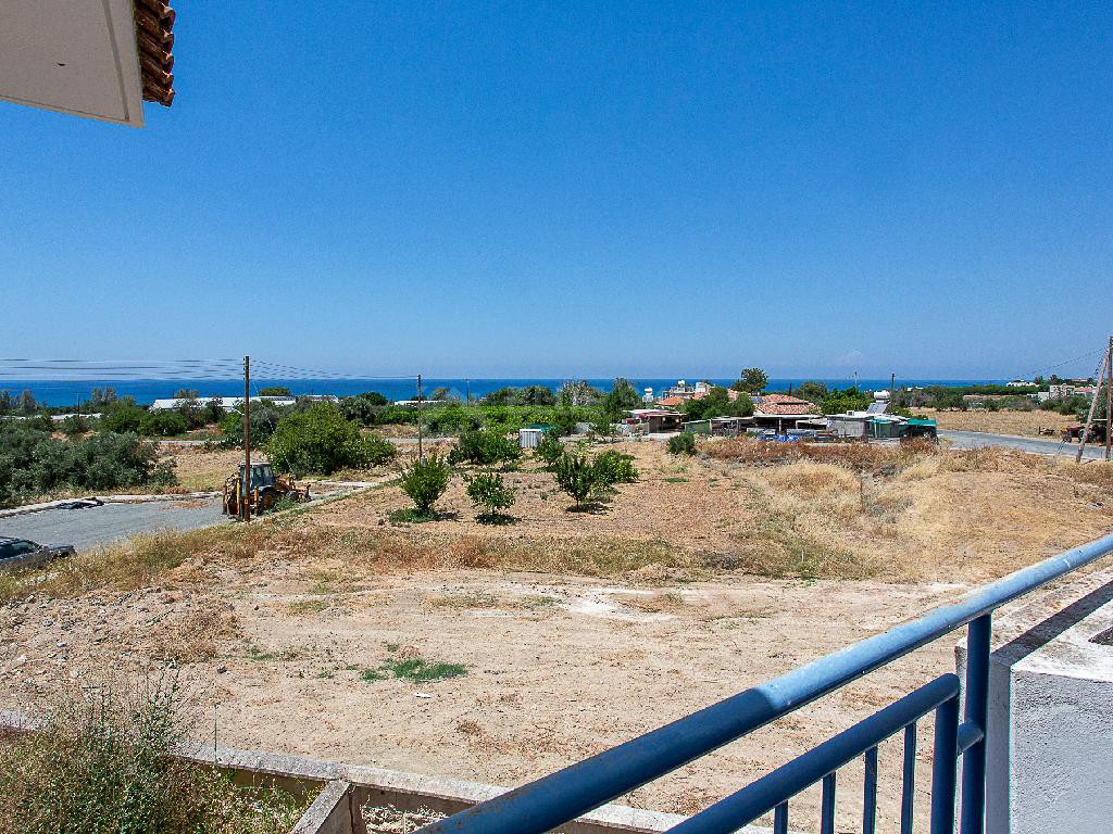 A two-bedroom house for sale in Argaka, Paphos, offering verandas, rooftop terrace, and excellent potential for permanent living, holidays, or rental investment.