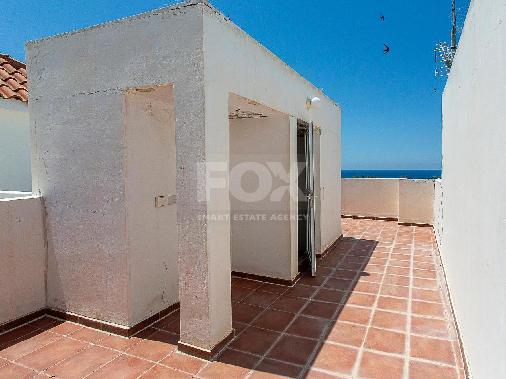 A two-bedroom house for sale in Argaka, Paphos, offering verandas, rooftop terrace, and excellent potential for permanent living, holidays, or rental investment.