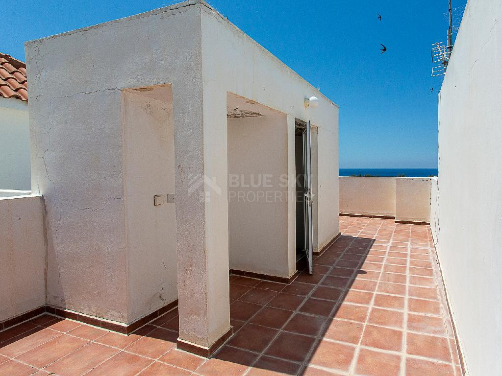 A two-bedroom house for sale in Argaka, Paphos, offering verandas, rooftop terrace, and excellent potential for permanent living, holidays, or rental investment.