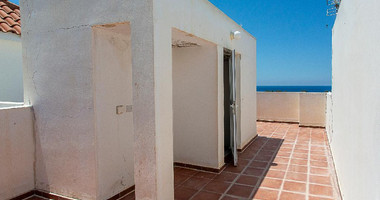 A two-bedroom house for sale in Argaka, Paphos, offering verandas, rooftop terrace, and excellent potential for permanent living, holidays, or rental investment.