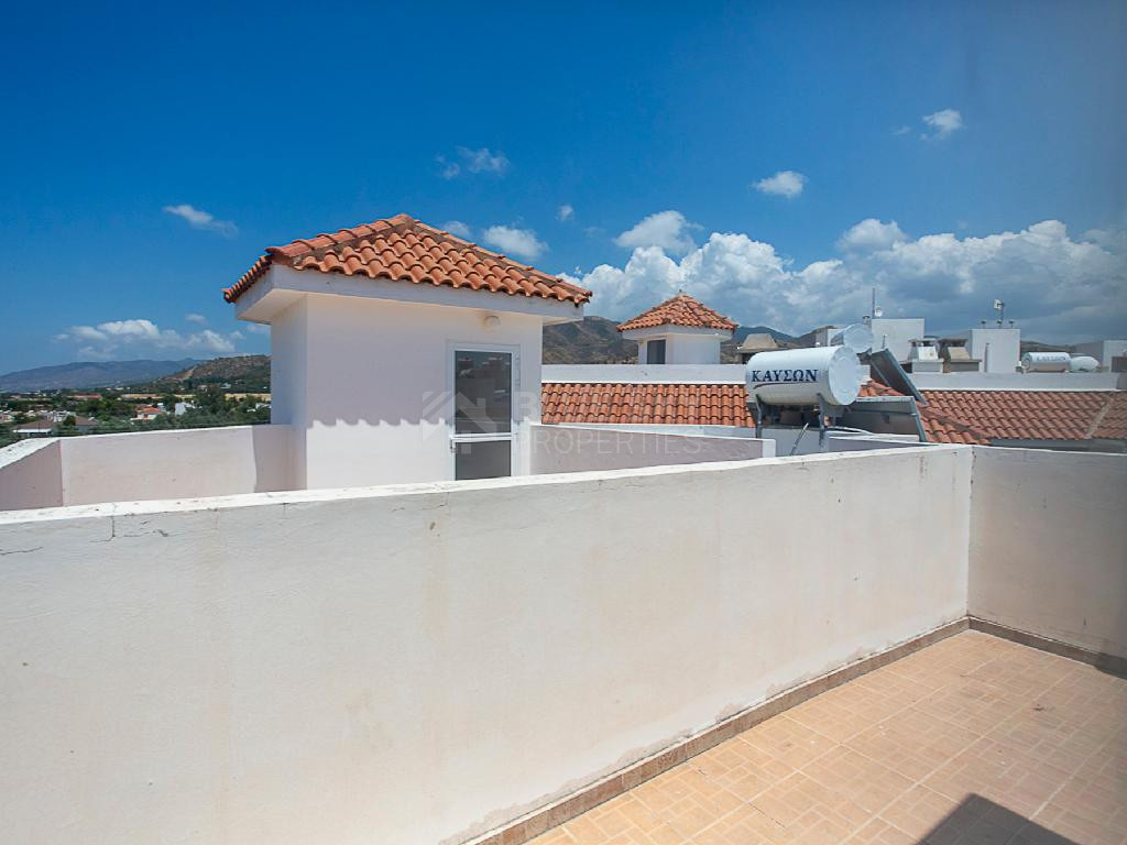A two-bedroom house for sale in Argaka, Paphos, offering verandas, rooftop terrace, and excellent potential for permanent living, holidays, or rental investment.