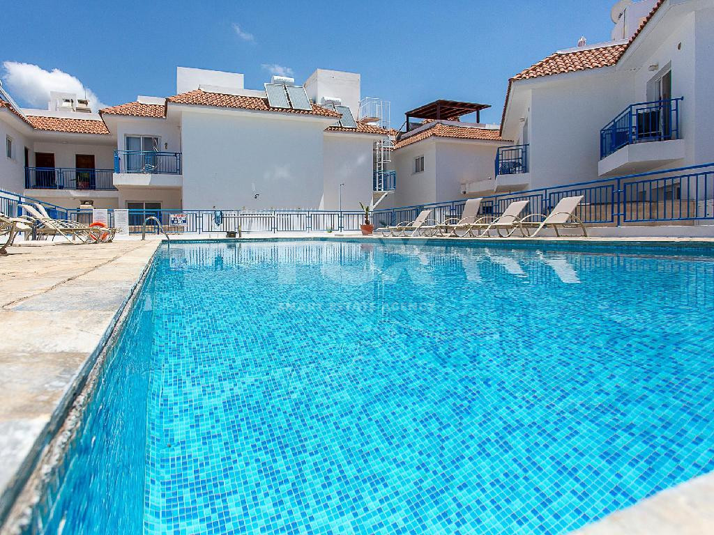 A two-bedroom house for sale in Argaka, Paphos with verandas, rooftop terrace, and excellent potential for permanent living, holidays, or rental investment.