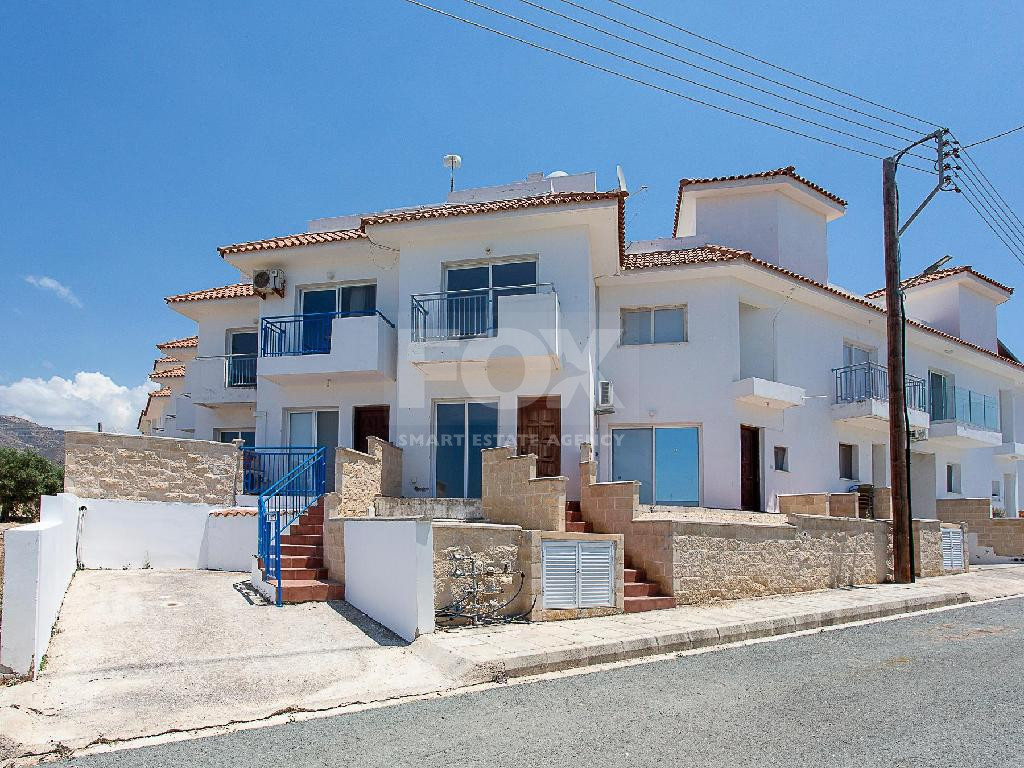 A two-bedroom house for sale in Argaka, Paphos with verandas, rooftop terrace, and excellent potential for permanent living, holidays, or rental investment.