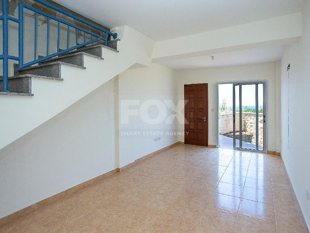 A two-bedroom house for sale in Argaka, Paphos with verandas, rooftop terrace, and excellent potential for permanent living, holidays, or rental investment.